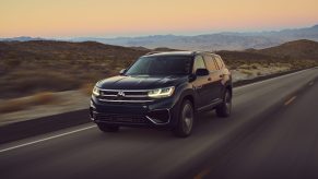 Dark blue 2022 Volkswagen Atlas with the sunset in the background
