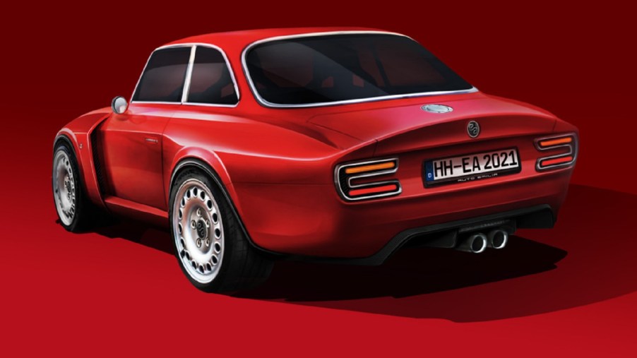 The rear 3/4 view of a red Emilia Auto Alfa Romeo Giulia GT Veloce restomod