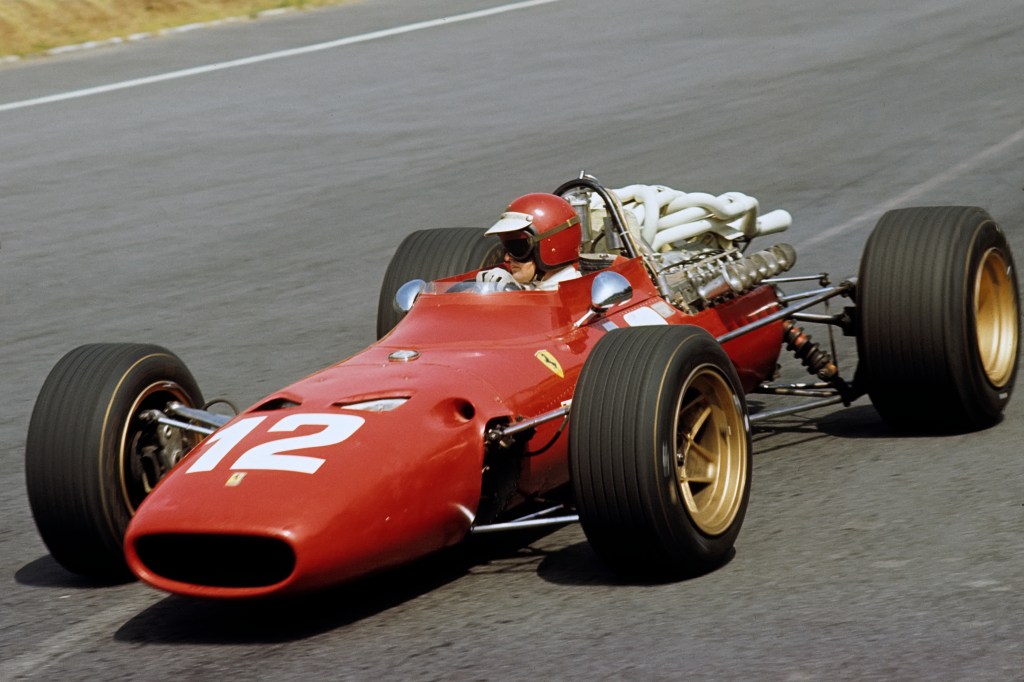 A photo of a real 1967 Ferrari 312 in a race