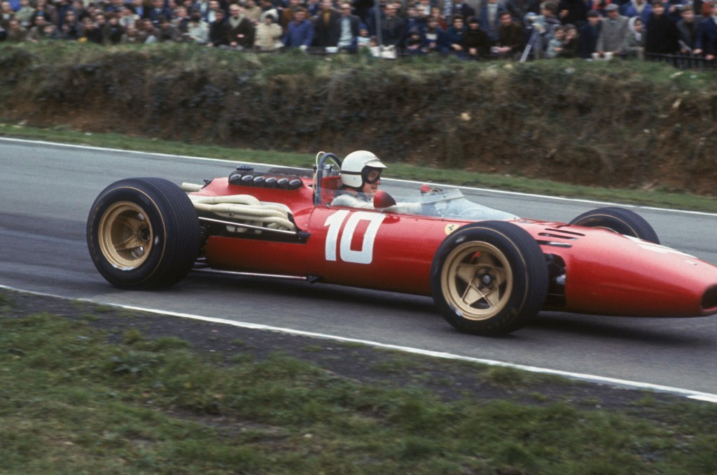 A photo of a real 1967 Ferrari 312 in a race