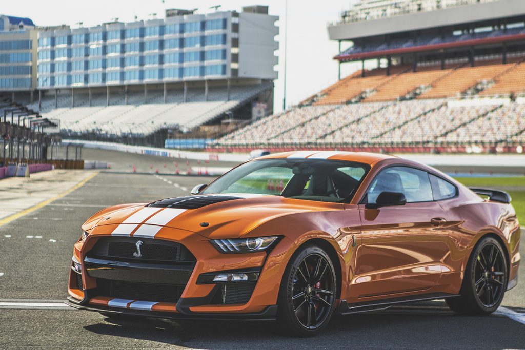 orange 2020 Ford Mustang Shelby GT500 similar to the car used in the drag race featured in this article