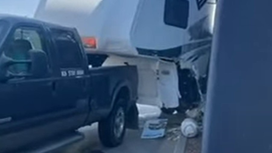 A Ford Super Duty towing a trailer through the drive through and nearly completely destroyed it.