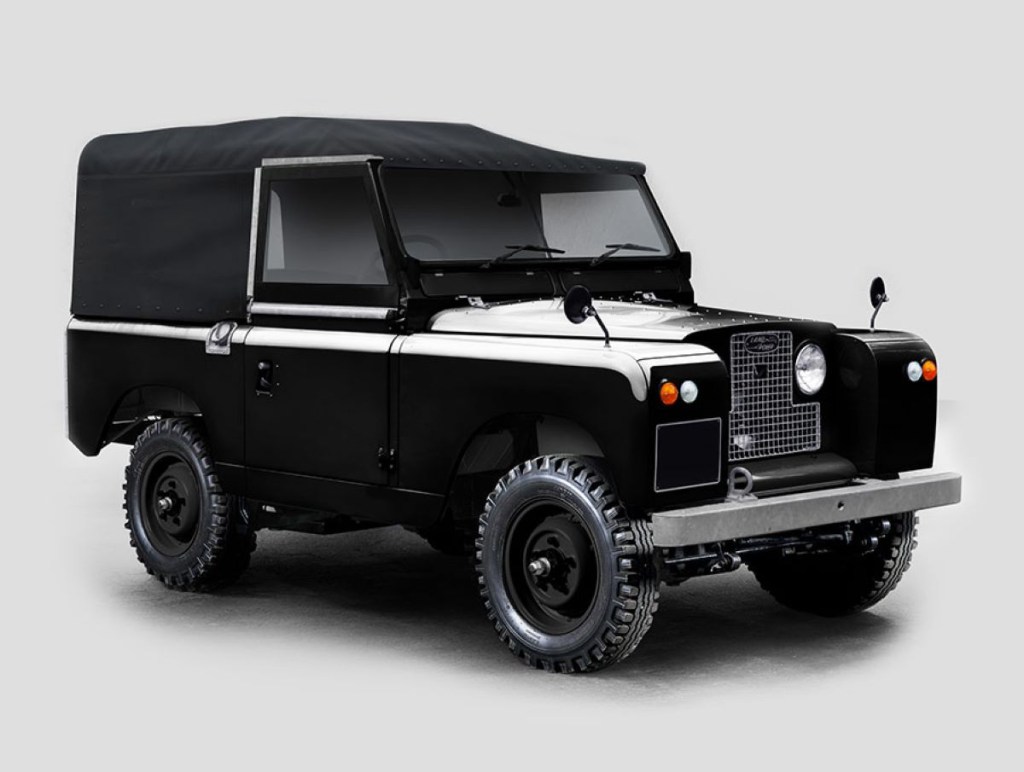 Front angle view of modified electric black Land Rover Series IIA