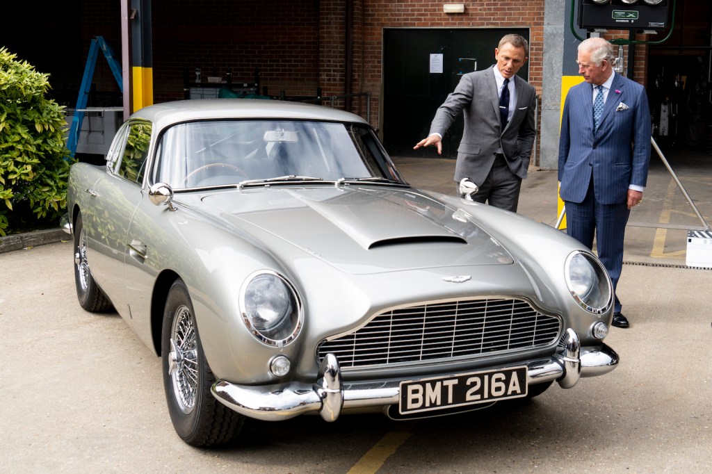 IVER HEATH, ENGLAND - JUNE 20: Prince Charles (R), Prince of Wales meets British actor Daniel Craig as he tours the set of the 25th James Bond Film at Pinewood Studios on June 20, 2019 in Iver Heath, England. They discuss James Bond's classic cars. The Prince of Wales, Patron, The British Film Institute and Royal Patron, the Intelligence Services toured the set of the 25th James Bond Film to celebrate the contribution the franchise has made to the British film industry. (Photo by Niklas Halle'n - WPA Pool/Getty Images)