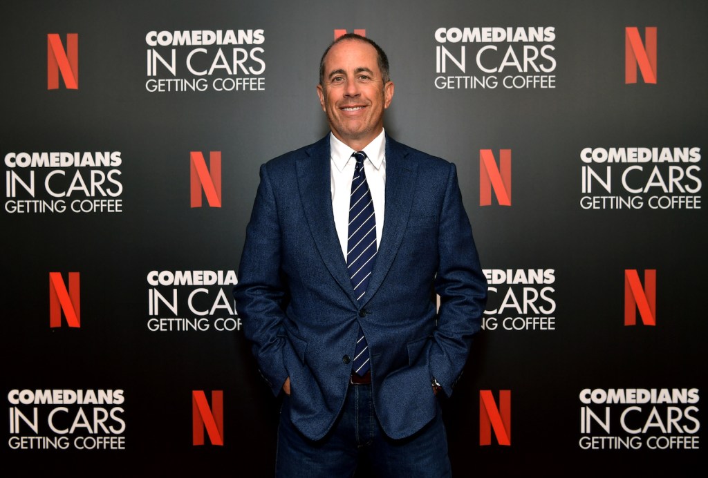 BEVERLY HILLS, CALIFORNIA - JULY 17: Jerry Seinfeld attends the LA Tastemaker event for Comedians in Cars at The Paley Center for Media on July 17, 2019 in Beverly Hills City. (Photo by Emma McIntyre/Getty Images for Netflix) On Comedians in Cars Get Coffee Jerry Seinfeld says Kevin Hart And This Classic 1959 Porsche 718 RSK Spyder Have Three Things In Common