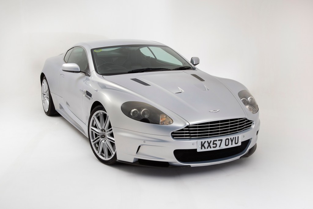 A silver 2009 Aston Martin DBS in a photo booth at the National Motor Museum