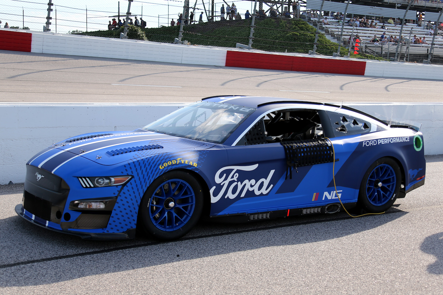 This is the 2022 NASCAR Next Gen Ford Mustang race car. The Next Gen cars are more stock than current NASCAR race cars.