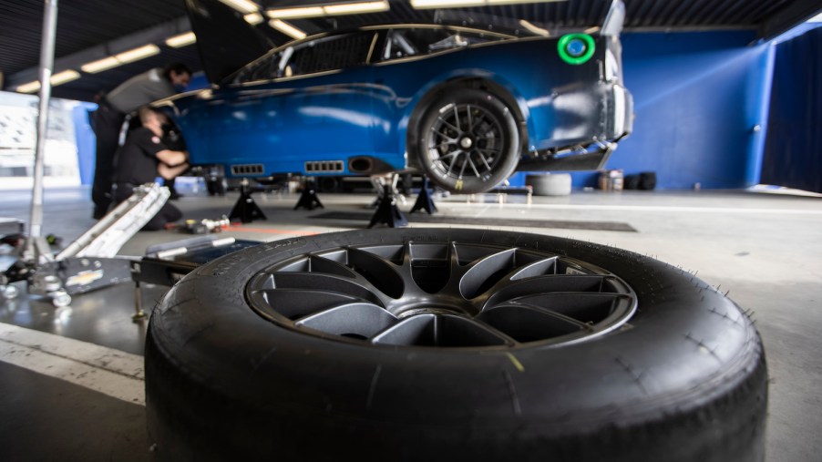 NASCAR Next Gen car and its centerlock monolug wheel rim without the traditional, five lug nuts during a Daytona test | James Gilbert/Getty Images