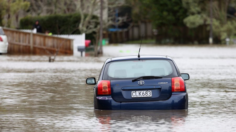 a car partially submerged after a flood. It's time to start taking steps to protect cars from flood damage