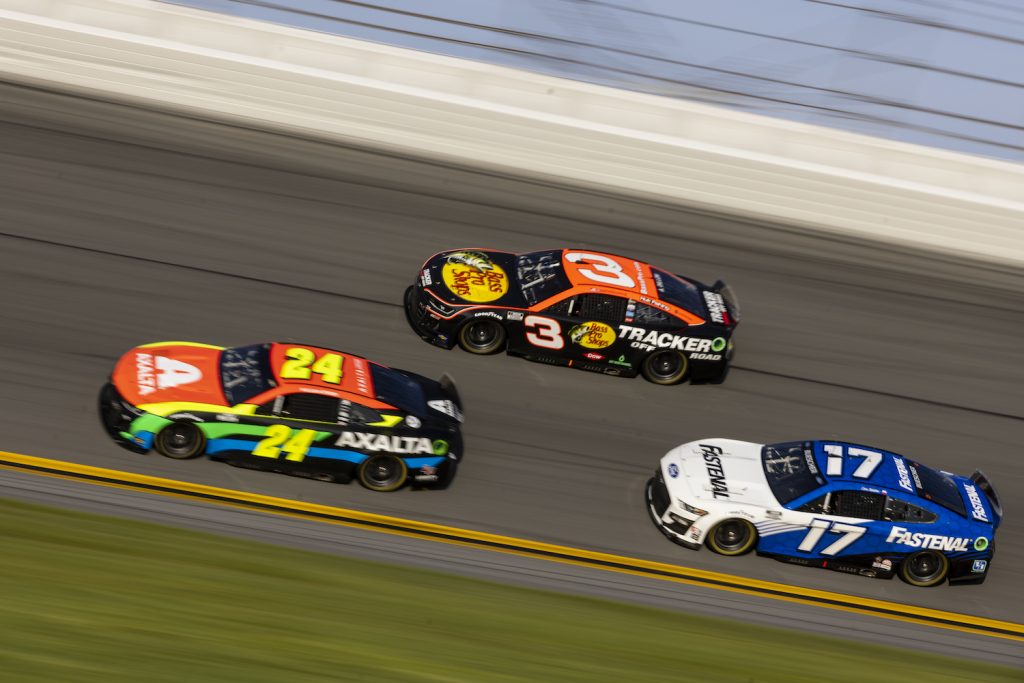 DAYTONA BEACH, FLORIDA - SEPTEMBER 07: Austin Dillon, Driver of the #3 NASCAR Next Gen car, William Byron, Driver of the #24, and Chris Buescher, Driver of the #17, drive during the NASCAR Cup Series test at Daytona International Speedway on September 07, 2021 in Daytona Beach, Florida. (Photo by James Gilbert/Getty Images) Next Gen NASCAR car.