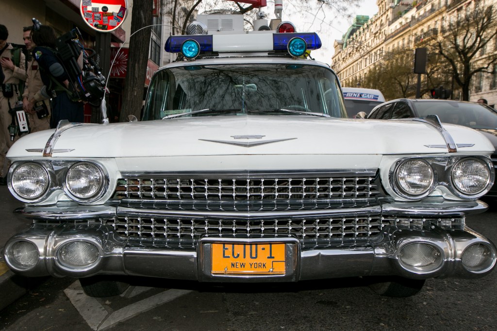 Ectomobile replica vehicle owned by a Ghostbusters fan. The Ghostbusters car, known as the ectomobile or ecto 1, is based on a 1959 Cadillac ambulance, a hearse in the movie. The original film car survives to this day and will appear in Ghostbusters: Afterlife. | Marc Piasecki/Getty Images