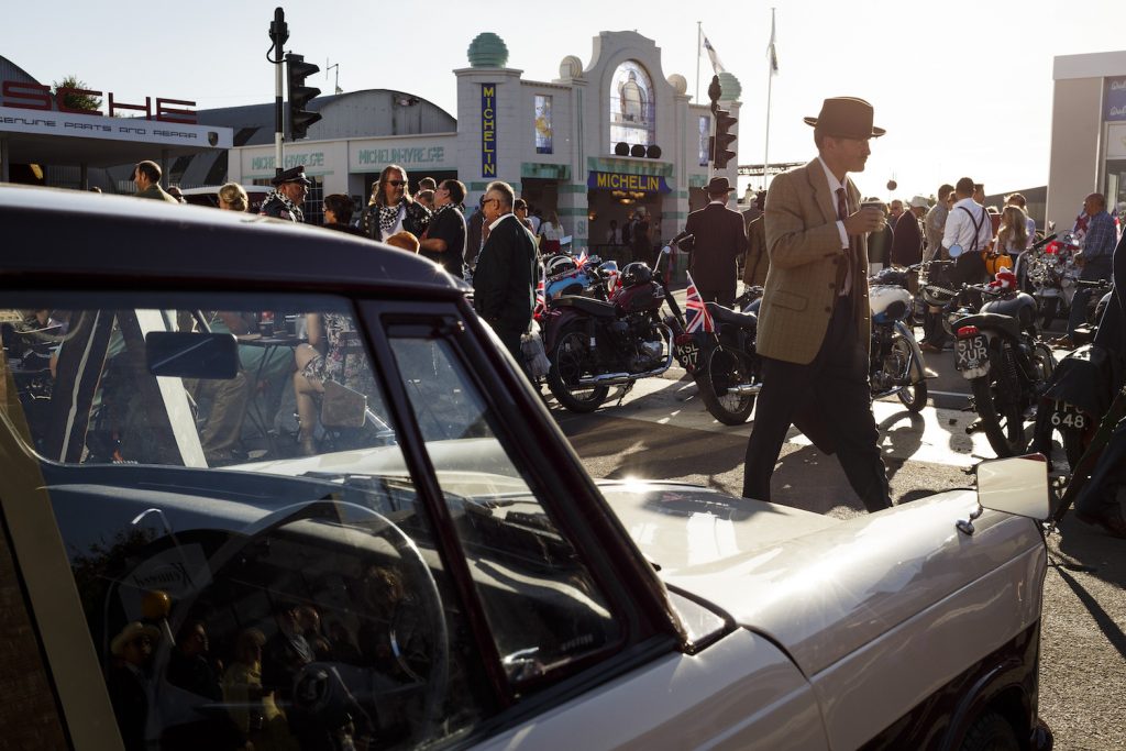 CHICHESTER, ENGLAND - SEPTEMBER 11:  People dressed in vintage clothes attend  the Goodwood Revival at Goodwood on September 11, 2016 in Chichester, England.  (Photo by Tristan Fewings/Getty Images) find out the Goodwood Revival schedule and whether you have to dress up for the Goodwood Revival.