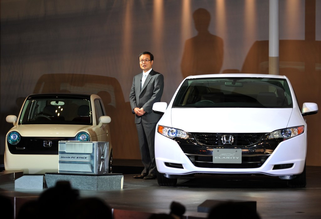 Honda Motor presents the new concept cars "EV" (L) and the "FCX Clarity" during the Tokyo Motor Show