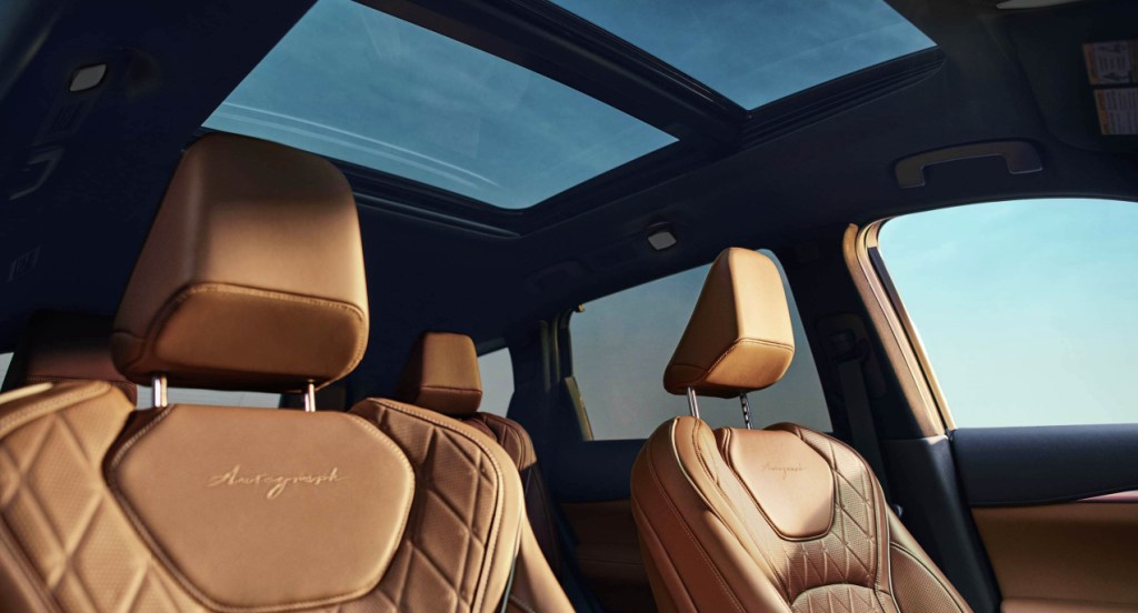 The brown quilted leather seats inside the 2022 Infiniti QX60 luxury SUV. 
