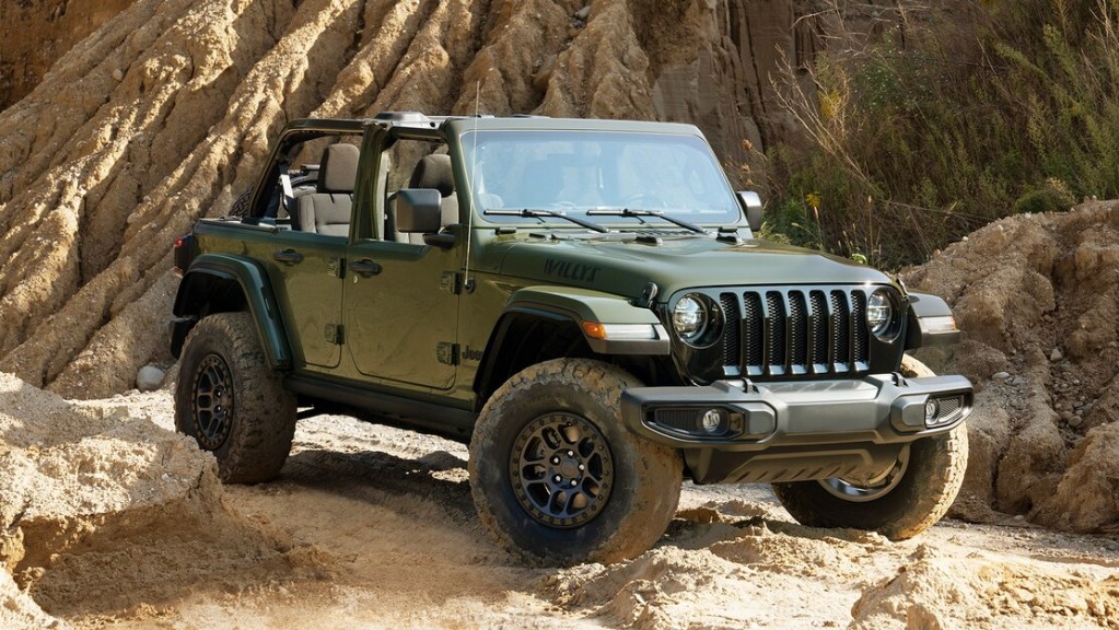 green 2022 Jeep Wrangler Willys Xtreme Recon parked in a desert