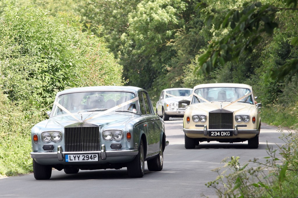 The wedding cars for Kate Moss' wedding sighted arriving at the wedding. These are two cars that belong to kate MOss' insane cool vintage car collection