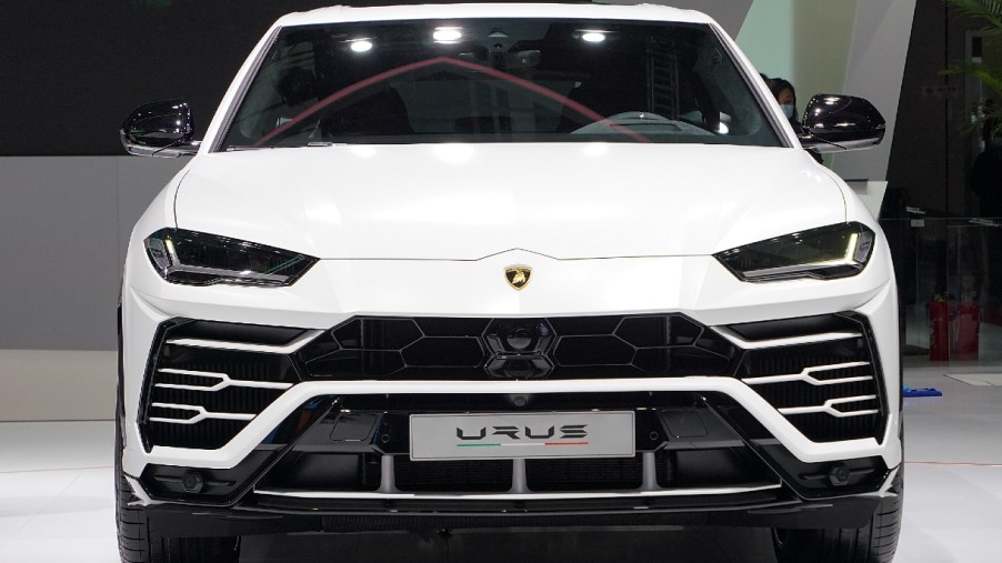 A white Lamborghini Urus is displayed during the 19th Shanghai International Automobile Industry Exhibition, also known as Auto Shanghai 2021, at National Exhibition and Convention Center (Shanghai) on April 20, 2021 in Shanghai, China.