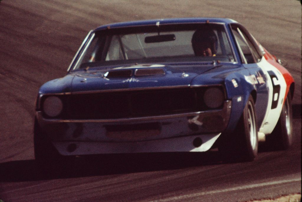 Mark Donohue racing his red-white-and-blue AMC Javelin at the 1970 Laguna Seca Trans Am race