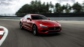A red 2021 Maserati Ghibli Trofeo