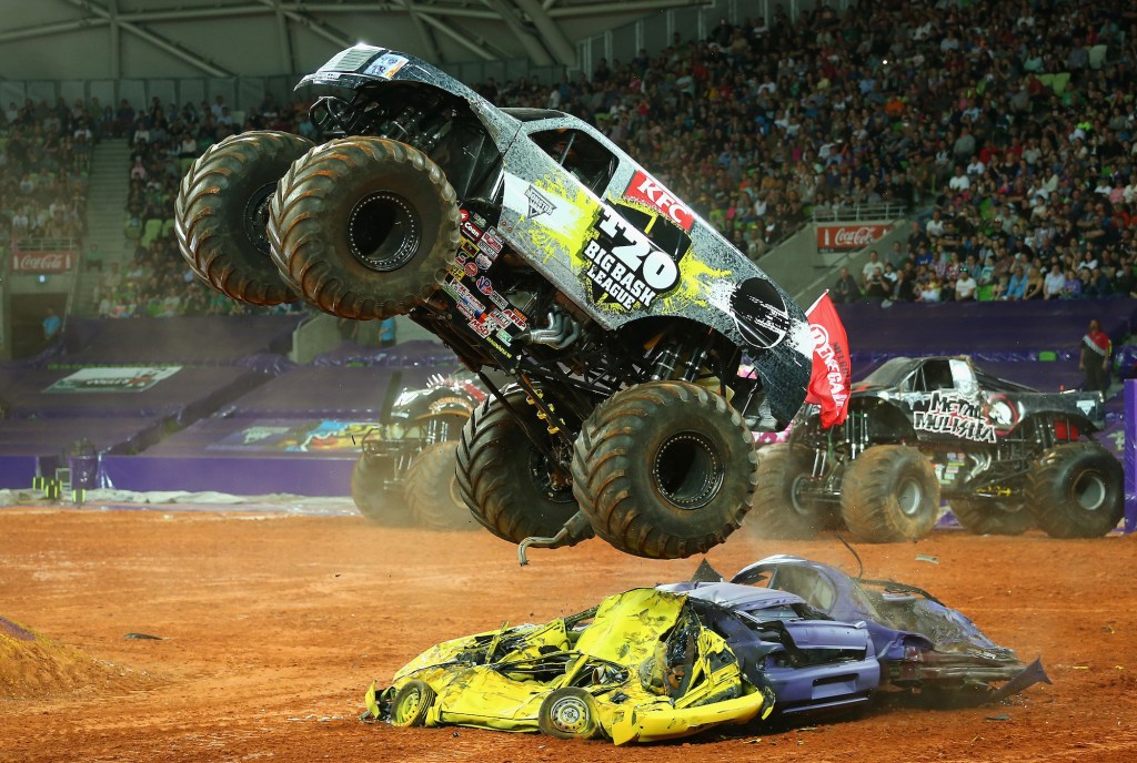 During Monster Jam in Melbourne, Australia, in October 2014, Marc McDonald jumps the monster truck Big Bash League over cars