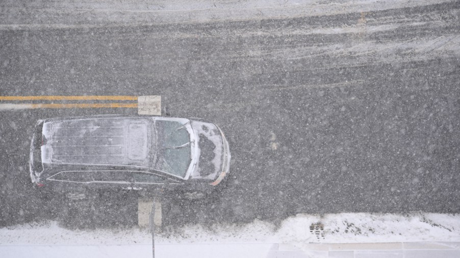An SUV on a snowy New Jersey road