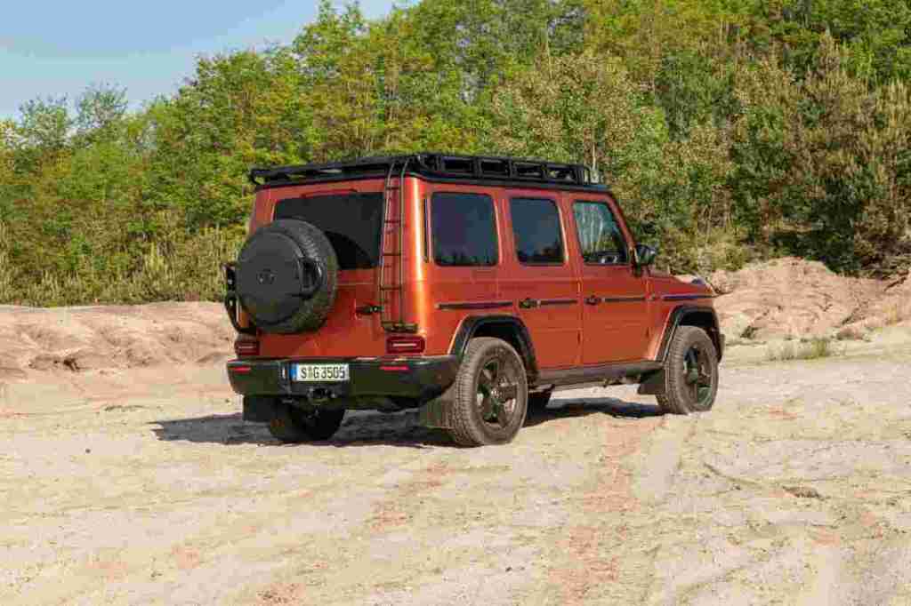 Passenger's side rear angle view of orange Mercedes-Benz G-Class Professional Line Exterior