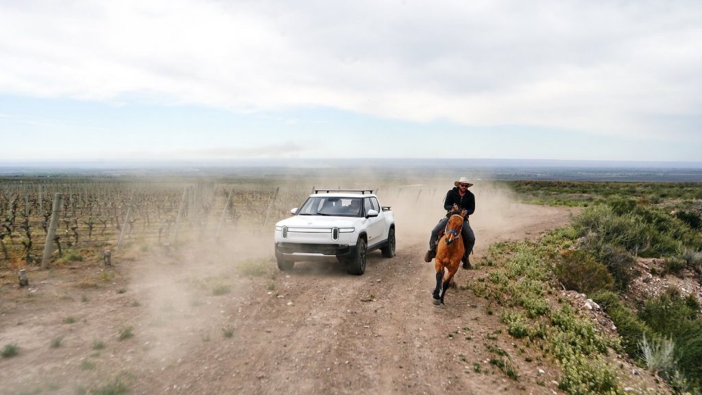 This is a press photo of the Quad-Motor Rivian Truck that Will Leave $100K EVs Far Behind. 