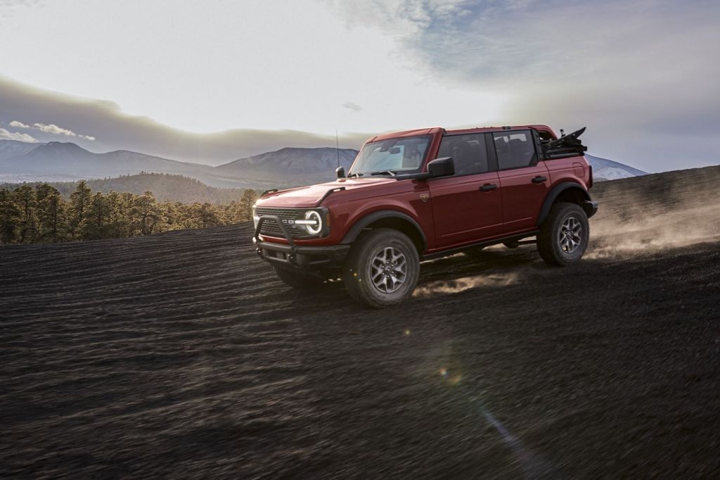 Red 2021 Ford Bronco with mountains in the background