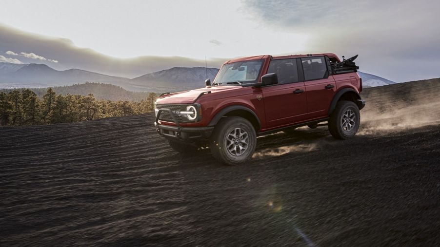 Red 2021 Ford Bronco with mountains in the background
