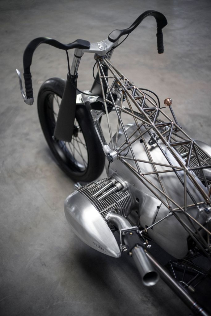 An overhead view of the Revival Cycles' Revival Birdcage showing the hand shifter, handlebars, forks, and one side of the boxer engine