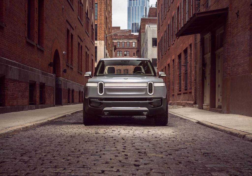 This is a publicity photo of the pre-production 2022 Rivian R1S electric SUV, an electric G Wagon at half the price.