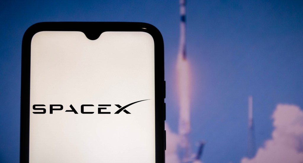 The Space Exploration Technologies (SpaceX) logo seen displayed on a smartphone. 