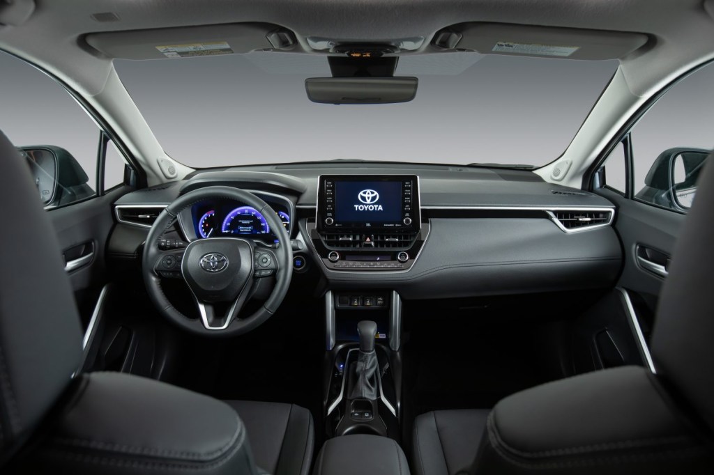Steering wheel, gauges, and touchscreen in 2022 Toyota Corolla Cross