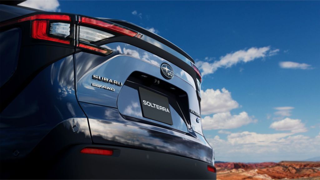 A teaser image of the 2023 Subaru Solterra EV taken in a desert location