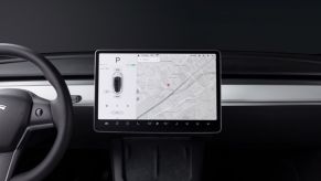 A Tesla Model Y interior touchscreen camera view