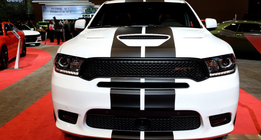 A white Dodge Durango SRT with black racing stripes is on display at the 110th Annual Chicago Auto Show at McCormick Place in Chicago, Illinois on February 9, 2018.
