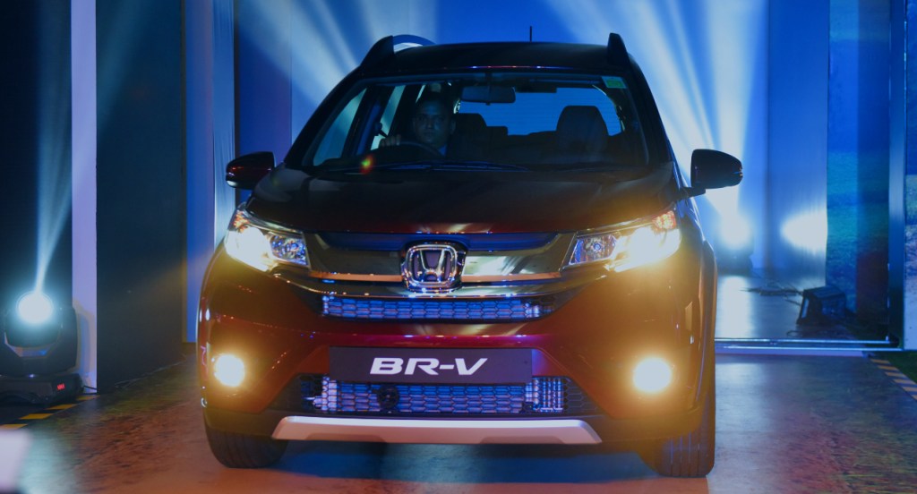 Front view of a red Honda BR-V subcompact crossover vehicle during its launch on May 5, 2016 in New Delhi, India.