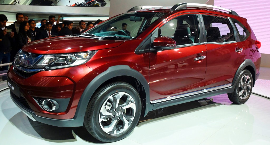 A red Honda BR-V Subcompact Crossover vehicle. 