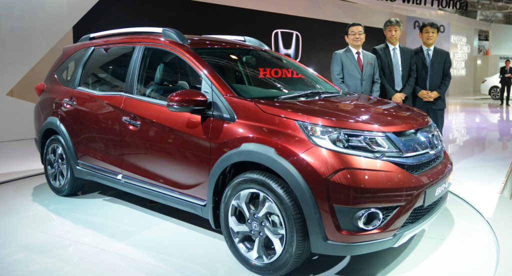 A red Honda BR-V Subcompact Crossover vehicle.