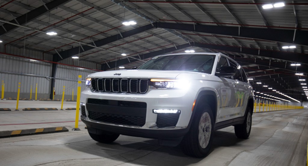 A white Jeep Grand Cherokee drives on the BSR (Buzz, Squeak and Rattle) indoor test track at the Stellantis Detroit Assembly Complex-Mack on June 10, 2021 in Detroit, Michigan.