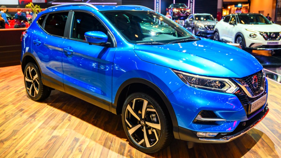A blue Nissan Rogue compact crossover SUV on display at Brussels Expo on January 9, 2020 in Brussels, Belgium.