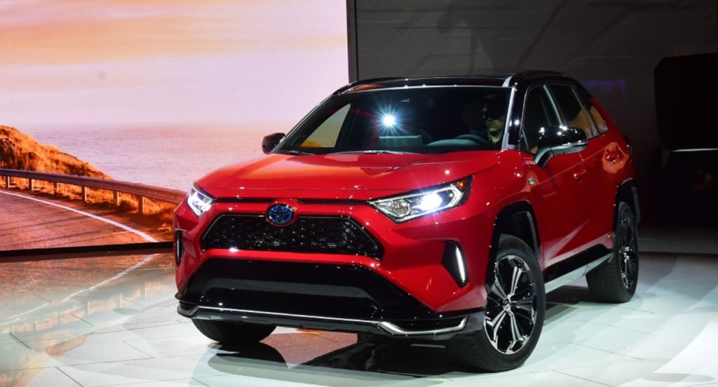 A red 2021 Toyota Rav4 Prime is on display.