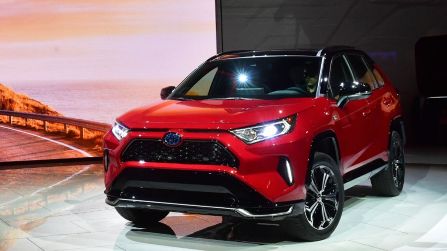 A red 2021 Toyota Rav4 Prime is on display.