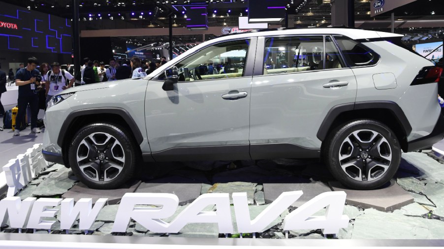 A Toyota Rav4 is displayed on the opening day of the Shanghai Auto Show in Shanghai on April 16, 2019. - Global car makers flock to the Shanghai Auto Show this week with the world's largest vehicle market facing an unfamiliar sales slump just as China veers toward an ultra-competitive electric future.