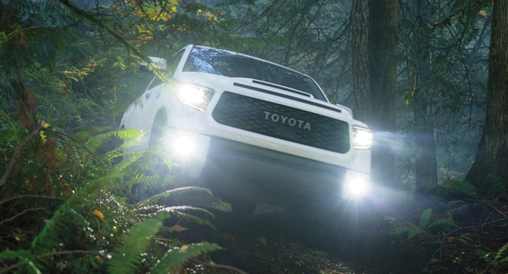 A 2021 Toyota Tundra off-roading in the woods