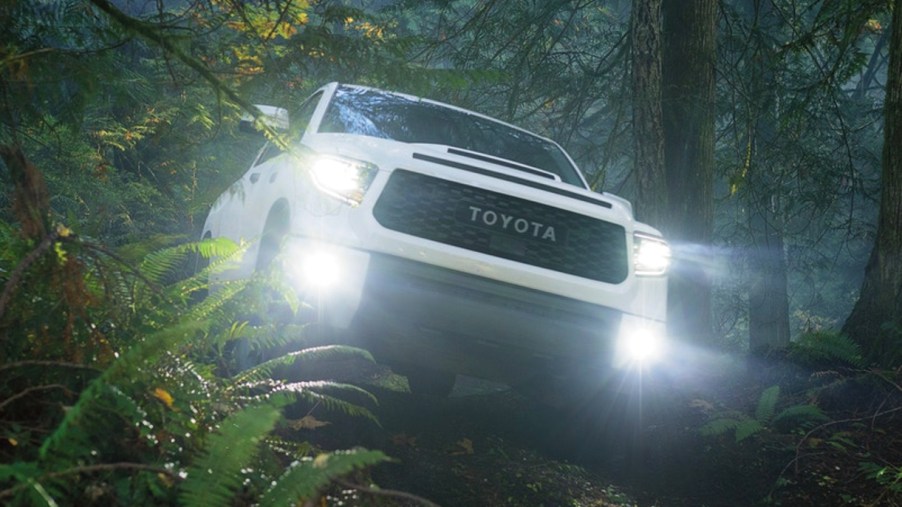 A 2021 Toyota Tundra off-roading in the woods