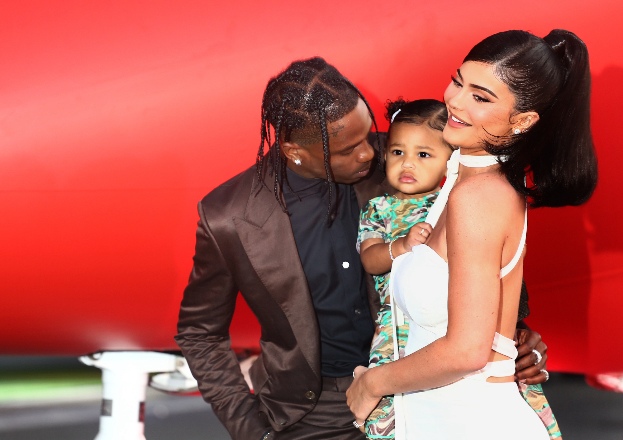 Travis Scott and Kylie Jenner with their daughter Stormi in August 2019