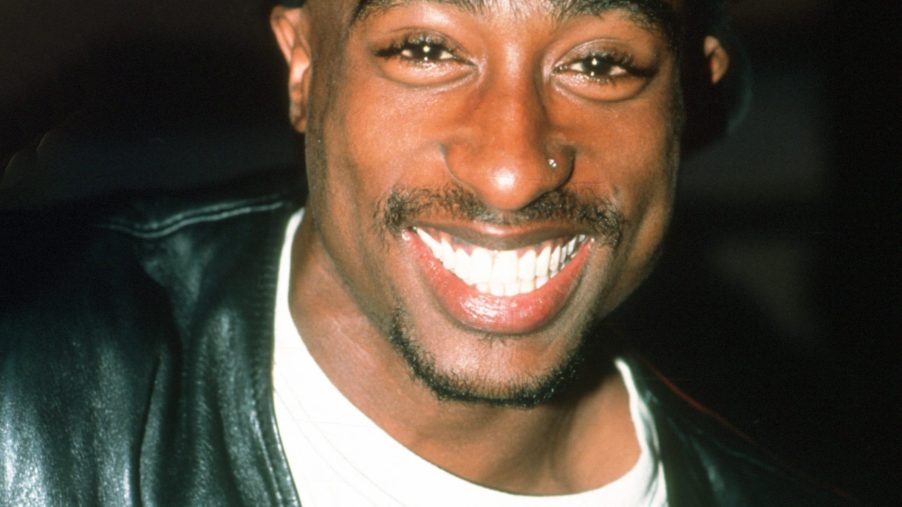 Tupac Shakur seen smiling before a performance