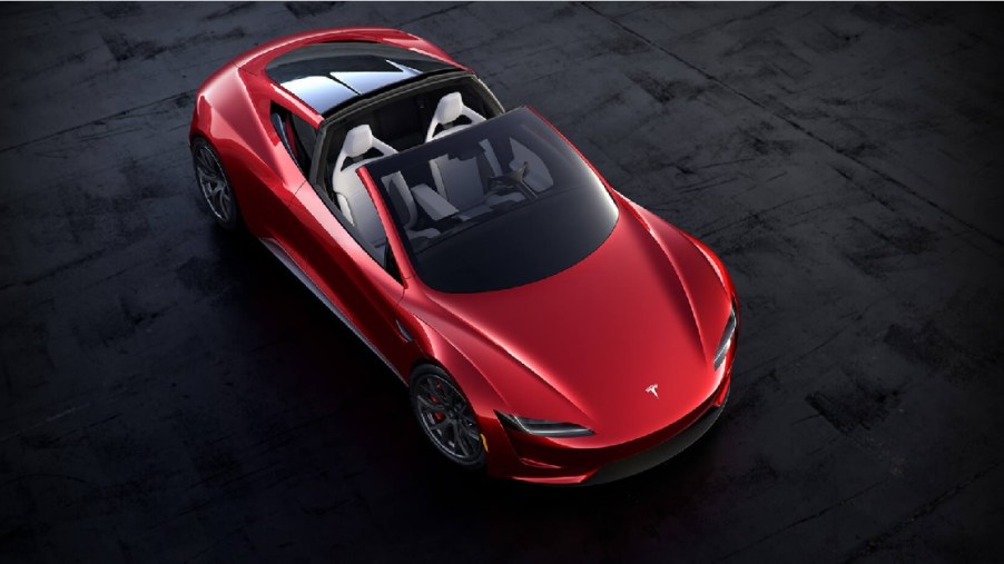 A red Tesla Roadster from above.