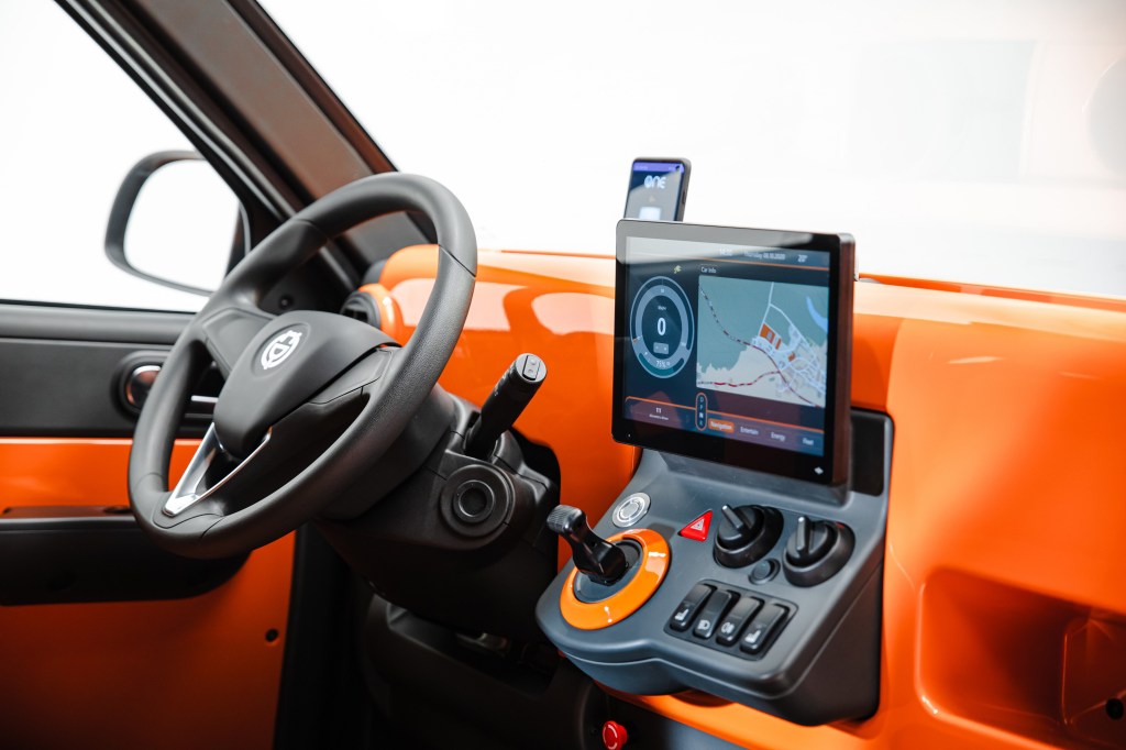 The orange and black interior of the City One